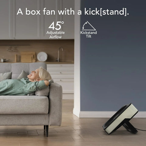 High Velocity Box Fan With Kick Stand, Digital Display, Removable Grille in living room with person on couch