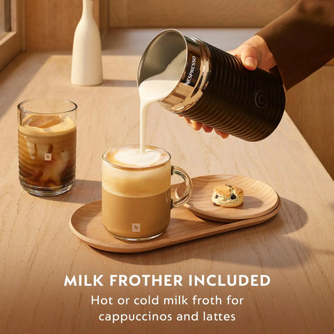 Person using Aeroccino milk frother for Vertuo Next Premium Coffee And Espresso Maker to pour milk into a cappuccino.