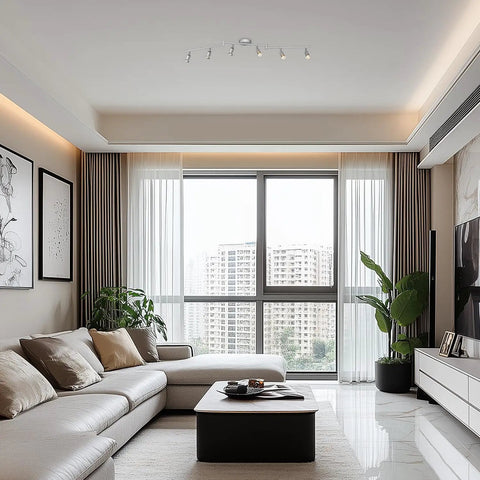 Payton 6 Light Foldable Track Lighting in matte silver with pivoting heads illuminating a modern living room.