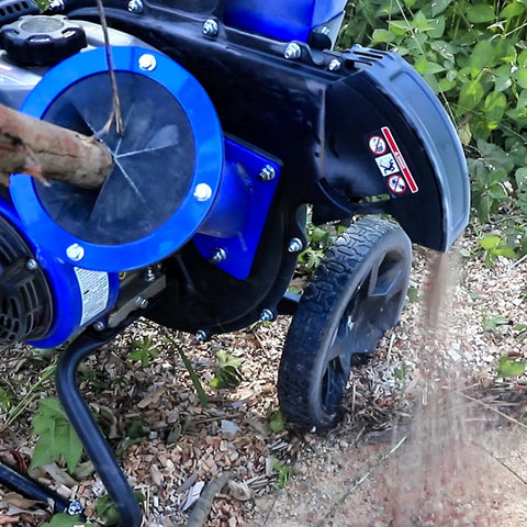 Gas Powered Wood Chipper Shredder Beast 7.5 HP 224cc Dual Function chipping wood with mulch falling onto ground