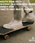 Close-up of skateboard in use with Skateboard Wheels 52mm x 32mm 101A Set Of 4 for street and park tricks, red color