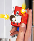 Three Inch TubiX S Pipe Cutter With QuickLock One Handed Adjustment For Copper And Stainless Steel Pipes From One Eighth To One And Eighth Inch Minimal Radius For Tight Spots shown in hand, illustrating size and use.