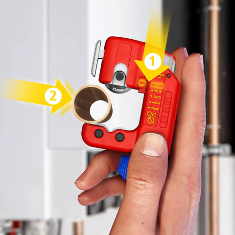 Three Inch TubiX S Pipe Cutter With QuickLock One Handed Adjustment For Copper And Stainless Steel Pipes From One Eighth To One And Eighth Inch Minimal Radius For Tight Spots shown in hand, illustrating size and use.