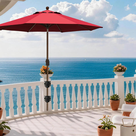 American Made Full Aluminum Non-Rust Deck Umbrella Mount attached to railing on sunny balcony with ocean view, red umbrella.
