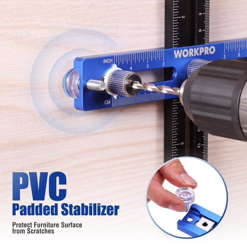 Close-up of aluminum cabinet hardware jig with 4mm drill guide, showing precision drilling on wood with PVC padded stabilizer.