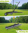 Tow Behind 40 Inch Dethatcher With 20 Spring Steel Tines For Large Lawns in walking and working mode on grass