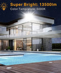 Outdoor 150W LED Flood Light With Dusk To Dawn Photocell illuminating a modern house with pool at night.