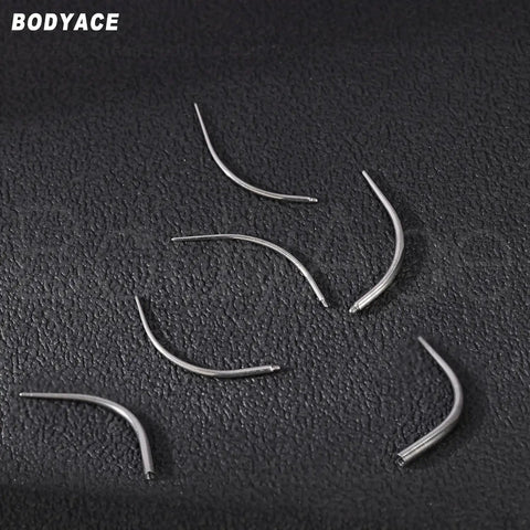 G23 Titanium Threadless Piercing Taper Kit For Ears 14G 16G 18G insertion pins on black background