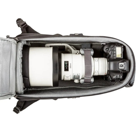 Glass Limo Camera Backpack For Pro DSLR Gear With Tripod Mount holding large tele lens and DSLR body, black, open view