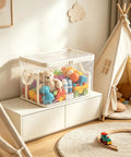 Set Of Three Thick Clear Plastic Storage Bins With Hinged Lids Heavy Duty Stackable Organizer Boxes For Bedroom Closet And Travel Gear in child's room.