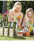 Woman and child with 9-Piece Heavy Duty Garden Hand Tools Set With Rust-Proof Stainless Steel Tools And Cool Organizer Tote