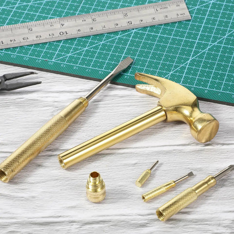 Six In One Mini Hammer And Screwdriver Set Portable Multitool with claw hammer, flat head and Phillips screwdrivers on desk