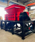 Heavy Duty Dual Shaft Tire Shredder Machine For Fleet Trucks And Standard Cars Ultimate Rubber Recycling Grinder showing red and black design.