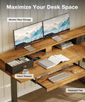Rustic Brown 59 Inch L Shaped Electric Standing Desk With Drawers, showing monitor riser and keyboard tray setup.