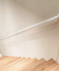 White Wrought Iron Stair Handrail With Heavy Duty Rust Proof Mounting Brackets For Indoor Outdoor Mobility Safety Grab Bar with wall installation.