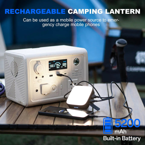 Rechargeable LED Camping Lantern 500LM 5200mAh Power Bank shown charging a phone on a campsite table.