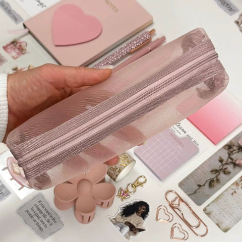 Hand holding pink pouch from Aesthetic Stationery Gift Set 22 Piece Bundle With Journal Box Blush Pink Includes Pencil Pouch Pens