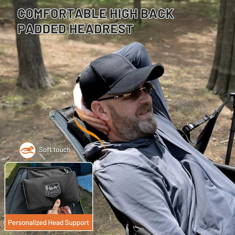 Man relaxing in Big Ol Oversized Hammock Camping Chair For Outdoors Ultra Comfort Up To 400 Lbs with padded headrest.