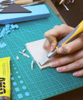 Using Exacto Knife Set For Precision Crafting, 16 Piece Hobby Knife Kit With Razor Sharp Blades on a crafting mat