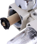 Close-up of Pro Grade Quarter Inch NPT Air Filter Regulator Lubricator Combo with semi-auto drain, brass construction, and clear housing.