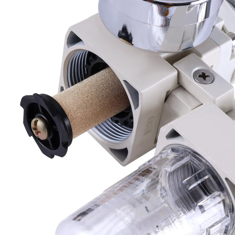 Close-up of Pro Grade Quarter Inch NPT Air Filter Regulator Lubricator Combo with semi-auto drain, brass construction, and clear housing.
