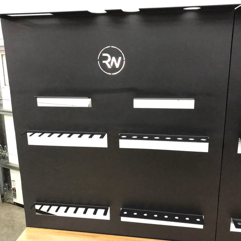 Black steel frame of Heavy Duty Workbench With Attachable Tool Organizer, Adjustable And Durable, showing tool slots