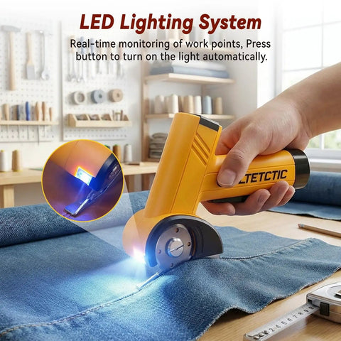 Heavy Duty Cordless Electric Scissors With 3 High Carbon Steel Blades For Cutting Cardboard Boxes Up To Quarter Inch Thick Leather And Carpet Four Speed Settings LED light illuminating denim fabric with scissors.