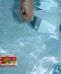 A hand applying Heavy Duty Rubberized Waterproof Sealant Paste In Bright White Half Quart Tub to a pool surface for repairs.