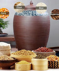 Level Up Your Pantry Setup With This Handmade Ceramic Food Storage Jar Featuring An Airtight Lid To Keep Flour Sugar Coffee Beans And Candy Fresh As New While Dropping Some Serious Cozy Vibe On Your Kitchen Counter, filled with rice and flour.