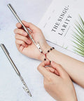 Set Of 2 Extendable Telescoping Clip Roach Clips For Joints And Jewelry Heavy Duty Steel Wire Clamp Bracelet Helper Tool in use