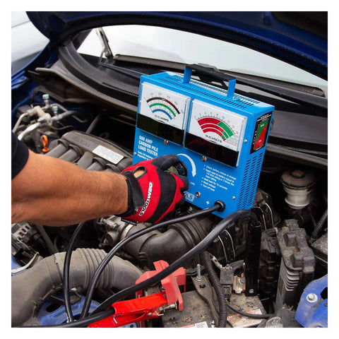 Mechanic using 500 Amp 12V Battery Load Tester With Carbon Pile Voltage Meter Regulator And Alternator Test on car engine