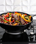12 Inch Cast Iron Skillet Preseasoned PFAS Free Chef Pan with vegetables and meat on stovetop