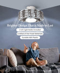 Child reaching for bladeless ceiling fan with lights and remote, Oceano 23 inch low profile modern ceiling fan for kids room.