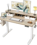 Electric Sit-Stand Standing Desk With Two Drawers, Adjustable Height From 28.3 To 47.2 Inches, 48 By 24 Maple Top, shown with electronics