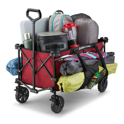 Heavy Duty Collapsible Outdoor Utility Wagon With Oversized 36 By 21 By 15 Bed And 150 Pound Capacity Red Foldable Rolling Cart With Cup Holders And Pockets For Beach Camping Sports Or Picnics fully loaded with outdoor gear