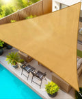 Installed Triangle Sun Shade Sail 12 Foot By 12 Foot By 12 Foot Outdoor Patio Garden Deck Yard Canopy With Ropes Breathable Shade Blocks 95 Percent UV Rays Tear Resistant Fade Resistant Sand over patio and pool area.