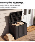 31 Gallon Outdoor Storage Box Waterproof UV Resistant Resin Bin For Patio Cushions Garden Tools Pool Accessories And Packages Lockable Wind Resistant Lid Steel Reinforced Heavy Duty Black shown on porch with packages inside.