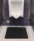 Disposable Urinal Mats With Time Monitor And Non Slip Adhesive For Charcoal Case Of 6 In USA in restroom setting