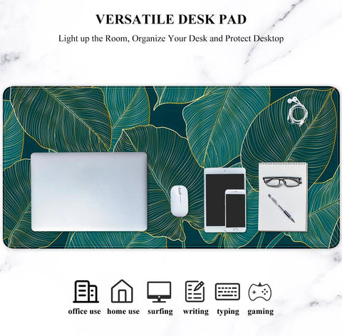 Ultra Large Green Tropical Leaves Desk Pad For Keyboard, Laptop And Computer, XXL Gaming Mouse Pad, Extra Big Full Size Mouse Mat, 35.5 By 15.7 Inches, Desk Setup Game Ready For Work And Gaming, shown with laptop, mouse, and stationery items.