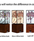 Three Cherry Blossom Tiffany Style Stained Glass Accent Table Lamps with USB Ports, shown in cool white, warm white, and off settings.