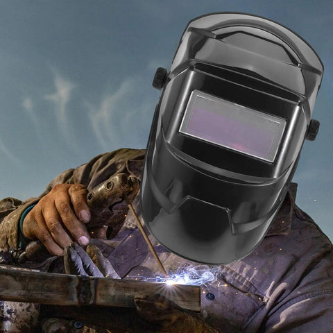 Upgrade Your Welding Game With 3pc 2.0 Magnification Lenses For Most Helmets Durable Pc Plastic Protective Shields Built To Last And Provide Super Clean Views Every Time You Hit The Torch. Welder using a welding helmet with sparks.