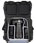 Interior of Roll Top 30L Camera Backpack With Laptop Sleeve And Rain Cover Asphalt Black showing camera and lens compartments.