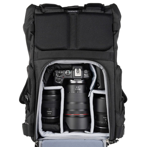 Interior of Roll Top 30L Camera Backpack With Laptop Sleeve And Rain Cover Asphalt Black showing camera and lens compartments.