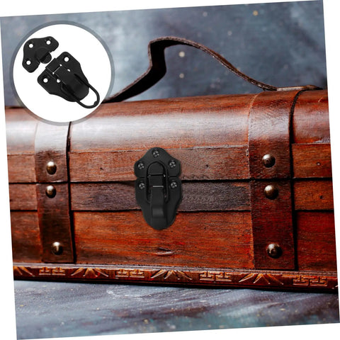 Eight Piece Retro Duckbilled Hasp Lock Set for luggage and antique boxes on a wooden chest, black zinc alloy.