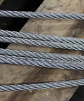 Four Leg Bridle Wire Rope Sling With Thimble To Screw Pin Anchor Shackle 1 3/4 Inch Diameter 30 Foot Length Eips 6X37 Iwrc Heavy Duty Rigging Cable close-up of steel wire cable on wood surface.