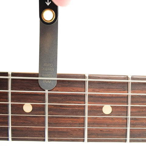 Relief Gauge Tool For Guitars Precision Truss Rod Neck Measurement Kit In Stainless Steel showing .006 size on guitar neck