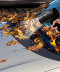 Using Beast Cordless Leaf Blower With 350000 RPM Turbo Motor for clearing autumn leaves off a car windshield, handheld and lightweight design
