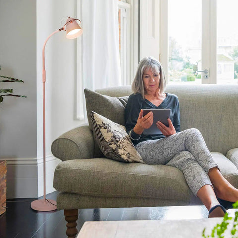Woman reading under Zoey LED Floor Lamp With Built In Dimmer Flexible Stand Up Task Light For Puzzles Crafting Sewing And Reading Ultra Bright 1200