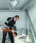 Pro Rig Cordless Angle Grinder With 125 Mm Disc And 18 Volt Brushless Motor Cranks Out 1100 Watts Of Torque In use cutting metal pipe.