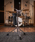 Road Ready Adjustable Snare Drum Stand With Heavy Duty Rubber Feet And Legit Double Braced Tripod, featuring a Black Drumstick Holder.